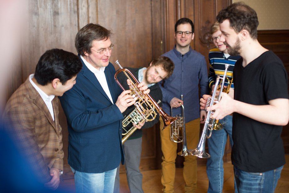 several people with trumpets