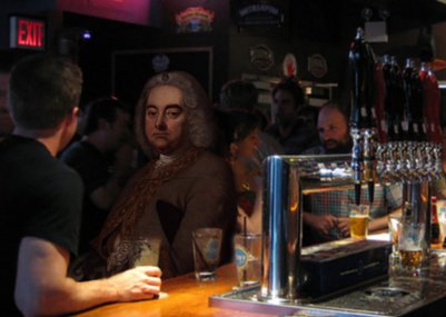 Handel sits at a pub bar