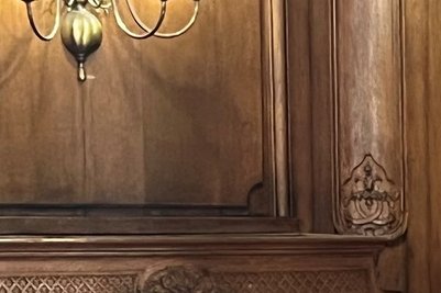 Two people sit and talk