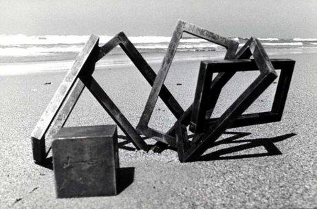 Stele sculpture on the beach
