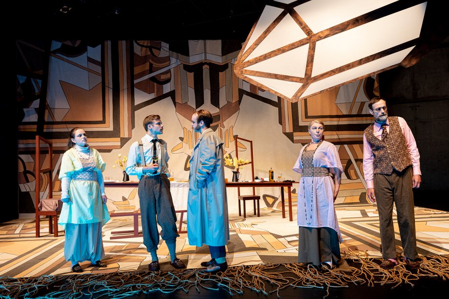 Five people in conversation.