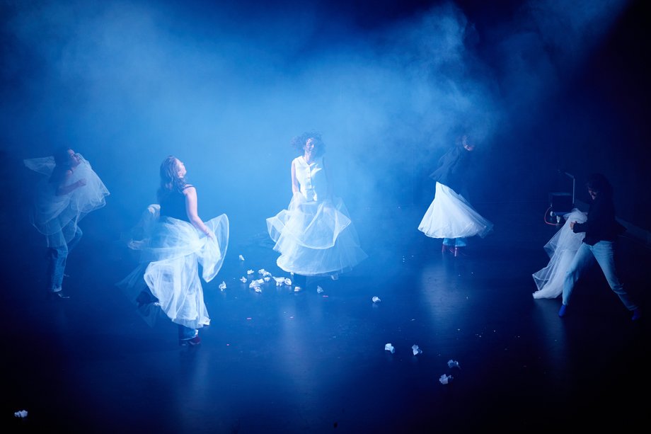 Actresses dance in the misty light