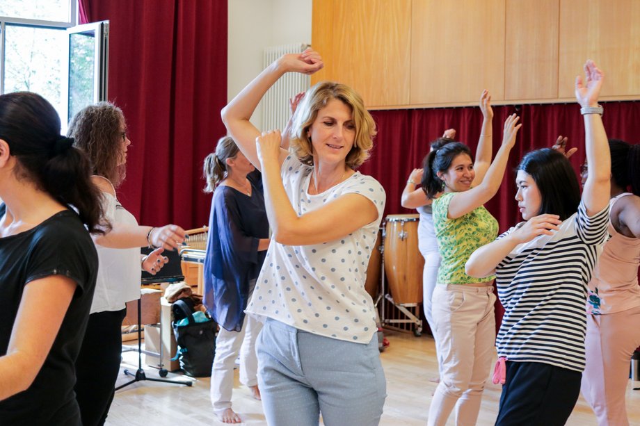 Course participants move through the room.